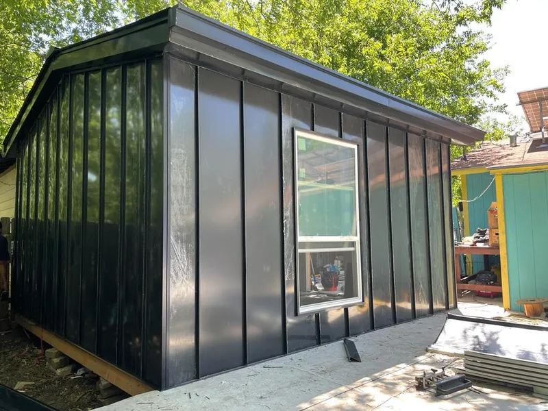 Black standing seam metal wall panels for Roof Inspection in East Earl