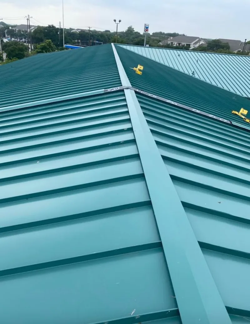 Green commercial metal roof ridge and valley for Metal Roof Repair in East Earl