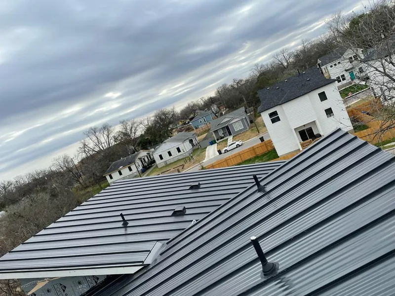 Standing seam metal roof panels with vents for Skylight Repair in East Earl